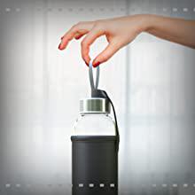 Bevanda di vetro delle bottiglie di acqua e coperchio contrassegnato 32 di tempo misurato ricordo di misure di stoccaggio di Juicing