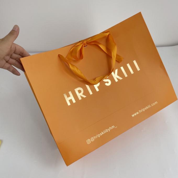 Sacchetto di imballaggio di alta qualità a basso costo di moda di lusso Borsa di carta per la spesa eco-compatibile laminata con la tua stampa del logo 5